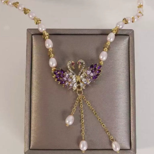 💎 LIMITED-TIME 50% OFF! 🦢 Double Swan Heart Pendant Necklace – Sparkling Purple Stones & Pearls 🔮