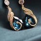 ✨ LIMITED-TIME 50% OFF! 🦚 Phoenix Earrings – Peacock Design, CZ Gems, Lightweight, Gift 🎁