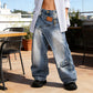 👖 LIMITED-TIME 50% OFF! 💥 Women's Asymmetrical Waist Wide-Leg Denim Jeans – Deconstructed, Distressed Wash, 3D Cut ✨