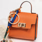 👛 2026 Sale — Over 48,000 Sold!✨ Mini Keychain Coin Purse – Gold-Tone Clasp & Ribbon Detail 🎀